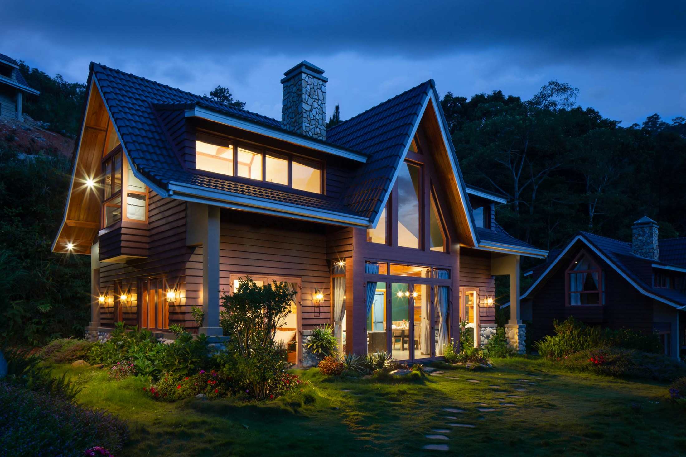 Representative dusk portrait of a two-story craftsman home, standing in for your home — not a photograph of the actual property